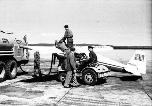 Fuelling Peter Gluckmann’s Luscombe at Goose Bay. Gluckmann wrote, “it’s really nice gas—115-145 octane; and the price is wonderful-26 cents a gallon.” Photo Fritz Adam 