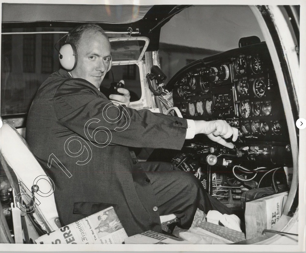 Gluckmann in his Meyers 200A, August 22, 1959. Newspaper caption reads: Peter Gluckman, 33, the 'Flying Jeweler,' is pictured at the controls of his single engine plane as he prepares to take off from airport in San Francisco yesterday on his most ambitious journey - a solo world flight. He hopes to set a world record. AP WIREPHOTO. Photographer unknown. Hard copy ebay item 176662510484