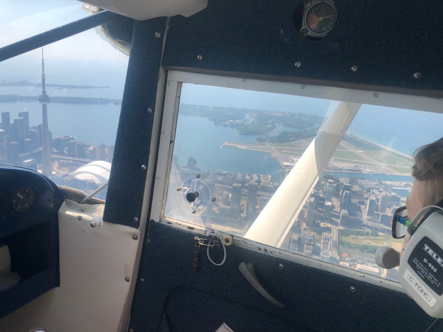 Luscombe 8F C-FEPO (formerly N1838B) Toronto, Ontario 2022. Admiring the CN Tower from above. 