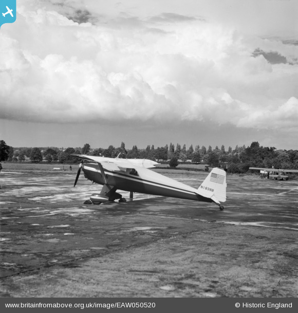 Luscombe 8 (N1838B) at Elstree Aerodrome, Aldenham near London in June 1953 (or possibly July 9, 1953). The pilot, Peter Gluckmann, visited his parents in London after flying from San Francisco over the North Atlantic. It is unclear if this photograph was taken before or after his flight to Berlin-Tempelhof. Photographer unknown. britainfromabove.org.uk/en/image/EAW050520